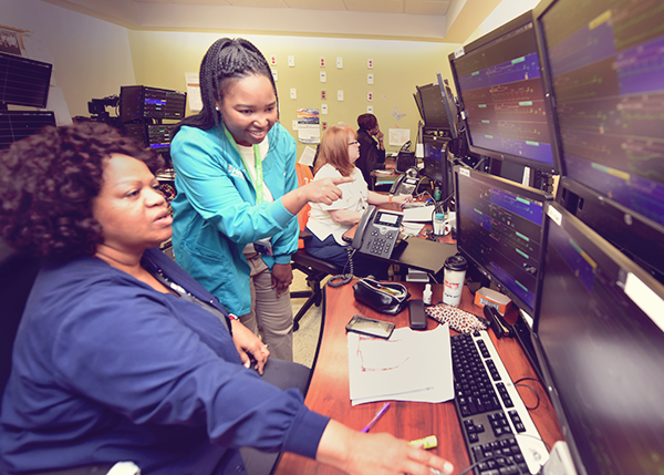 Two women working as inpatient liasons in the hospital